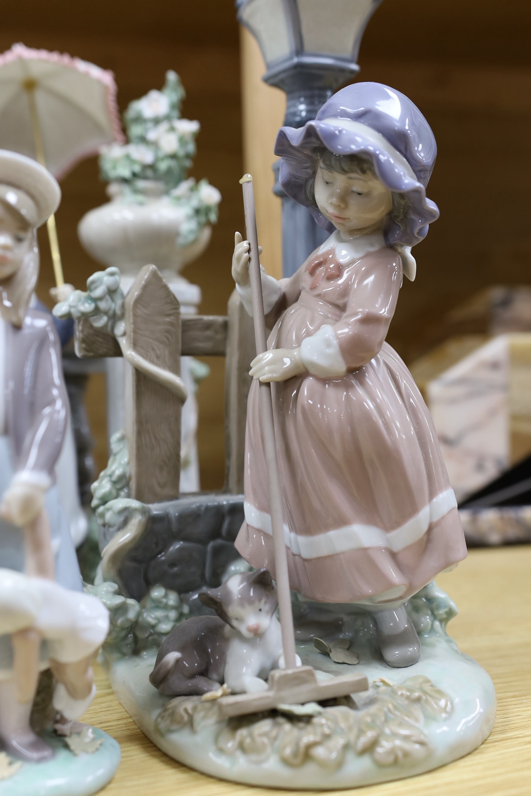 A selection of eight Lladro figures, tallest 33cm